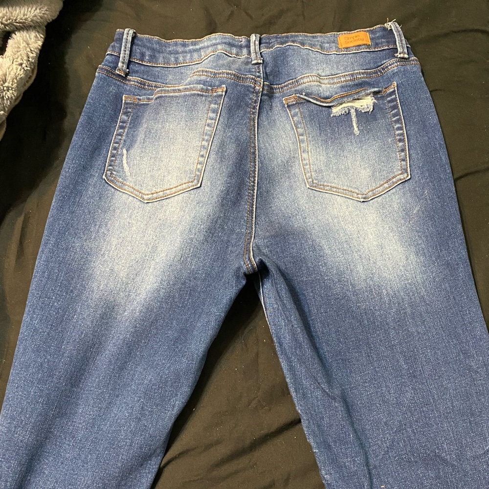 blue ripped jeans